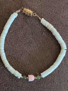 Handmade White Bead Bracelet with Pink Flower and Green Accent Beads